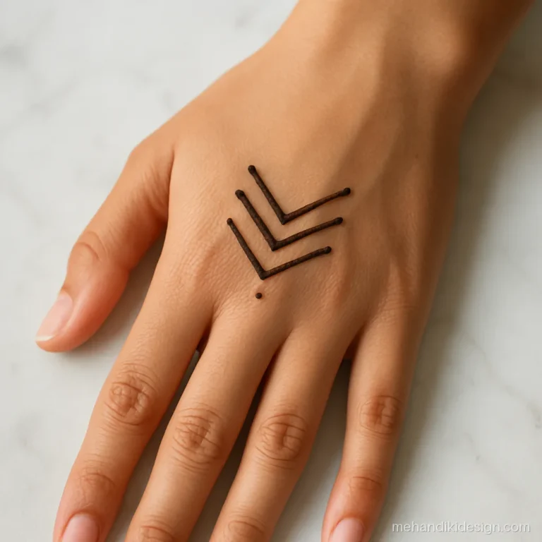 Aesthetic mehandi with a fine chevron line pattern on the back hand