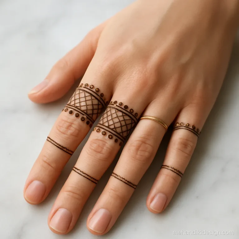 Beautiful mehndi back hand with a fine net band across the knuckles