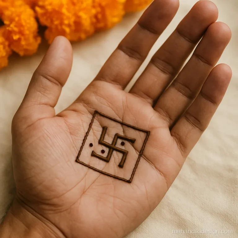Boys mehandi with a swastik and four dots on the palm