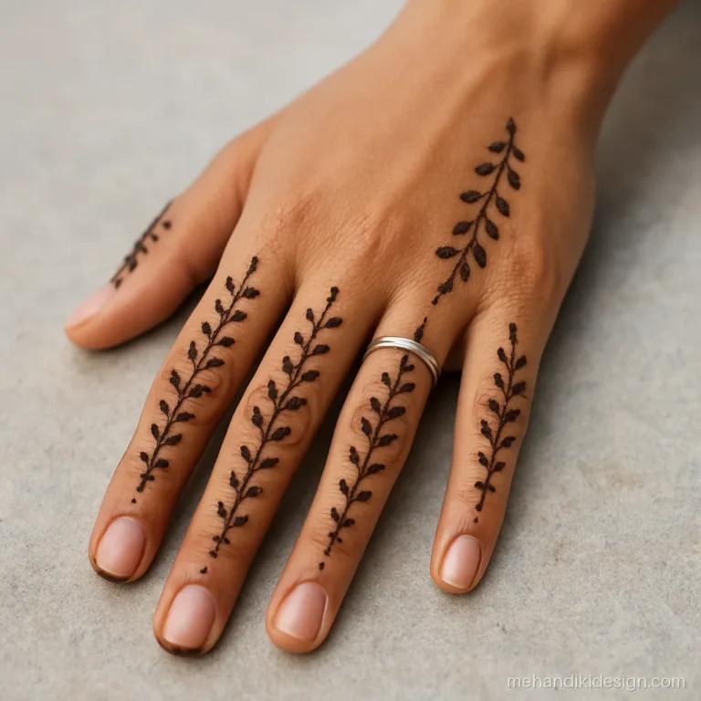 Mehandi designs for fingers with a dotted bel on all five