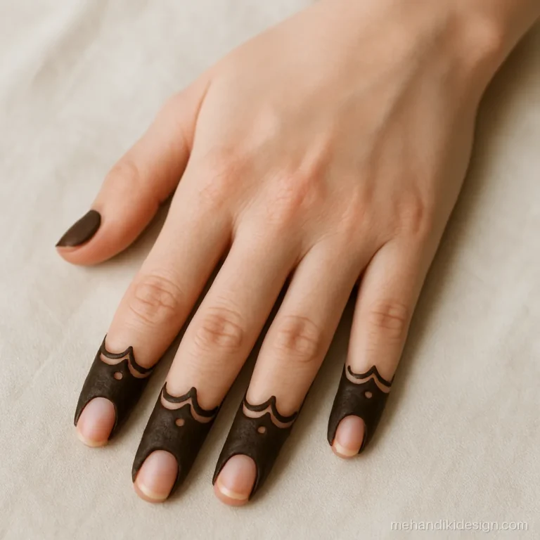 Finger mehandi design with solid fingertip caps and scalloped edges
