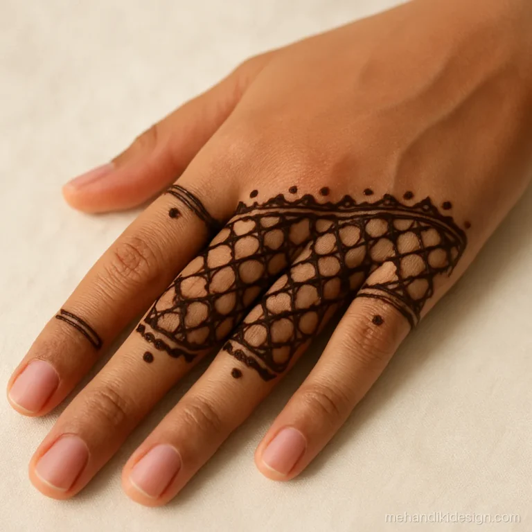 Mehandi design photos of a half palm jaal with a scalloped border