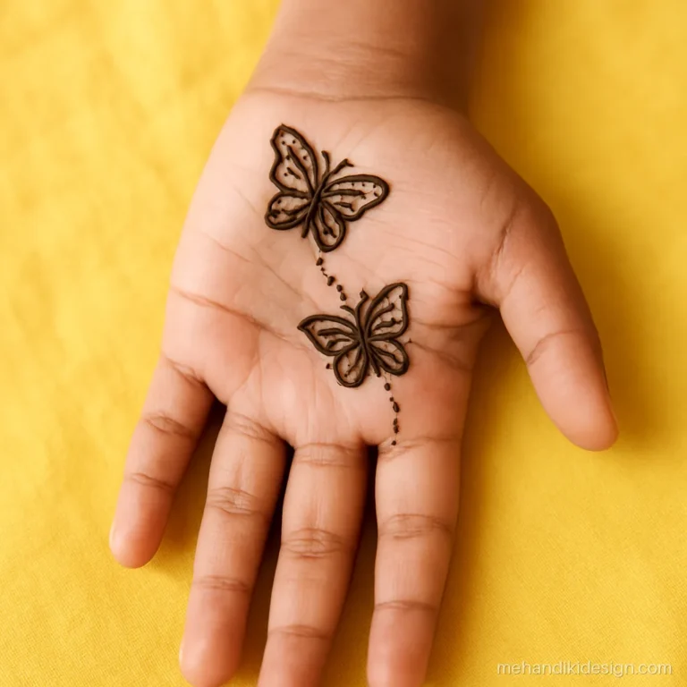 Mehandi for kids with two small butterflies flying across the palm