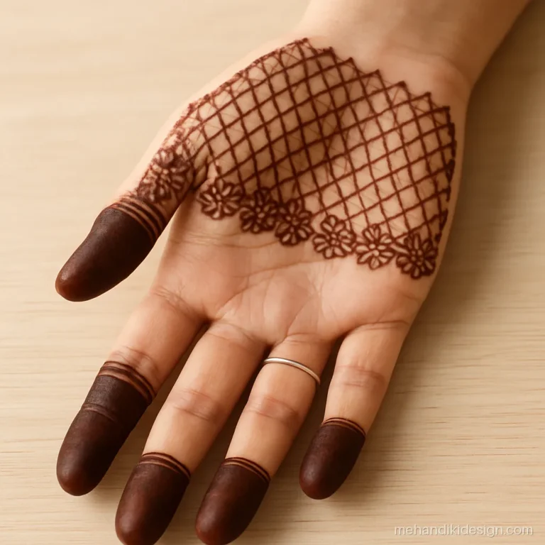 Mehandi ke design arabic with a half jaal net and floral border on palm