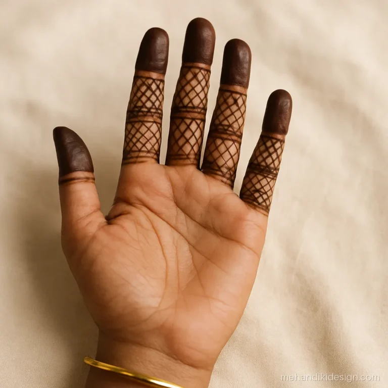 Simple front hand mehandi with checked fingers and a bare palm