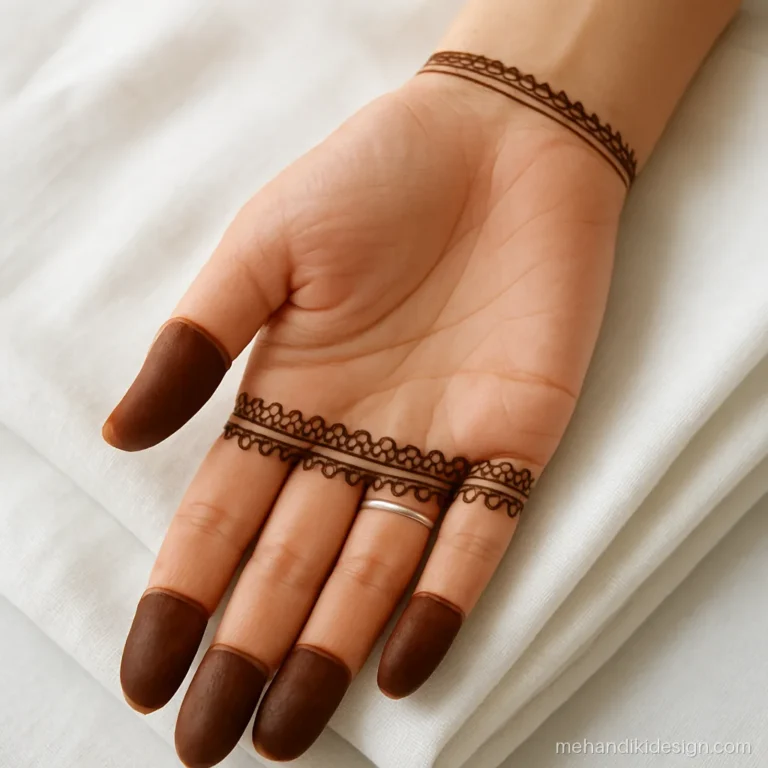 Simple mehandi design with two lace bands across the palm and wrist