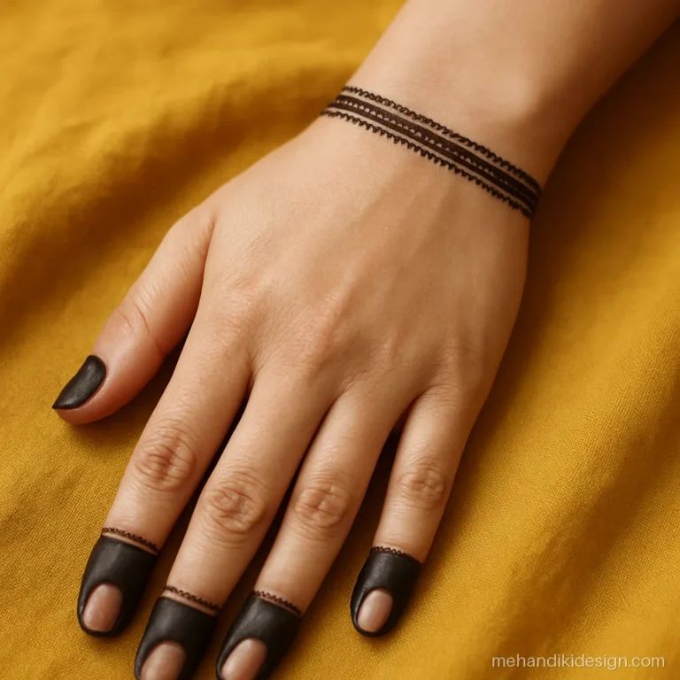 Simple mehandi ki design photo with a dotted wrist band and three finger caps