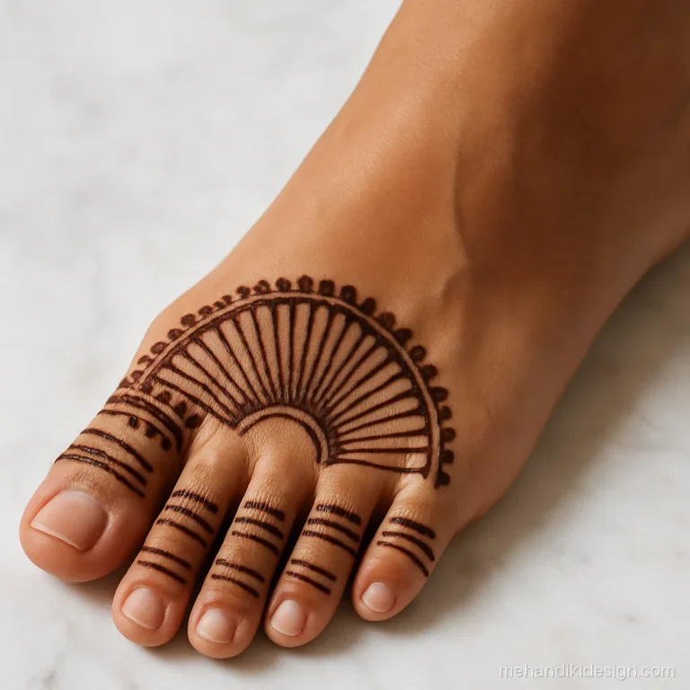 Foot mehandi with striped toes and a fan pattern at the front