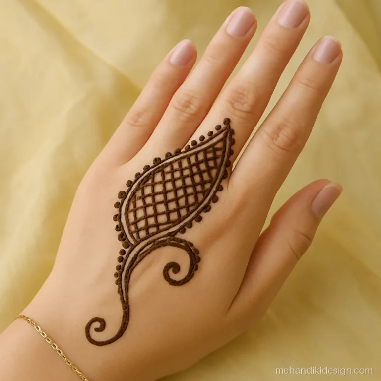 Stylish back hand mehandi with one bold kairi and swirl tail