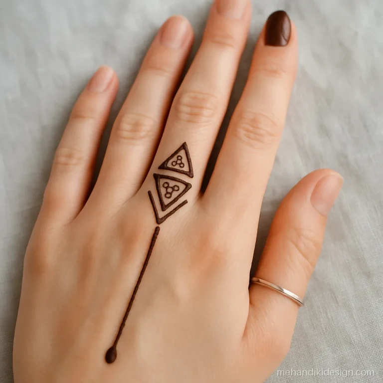 Stylish mehndi design simple back hand with stacked triangles and a dot drop line